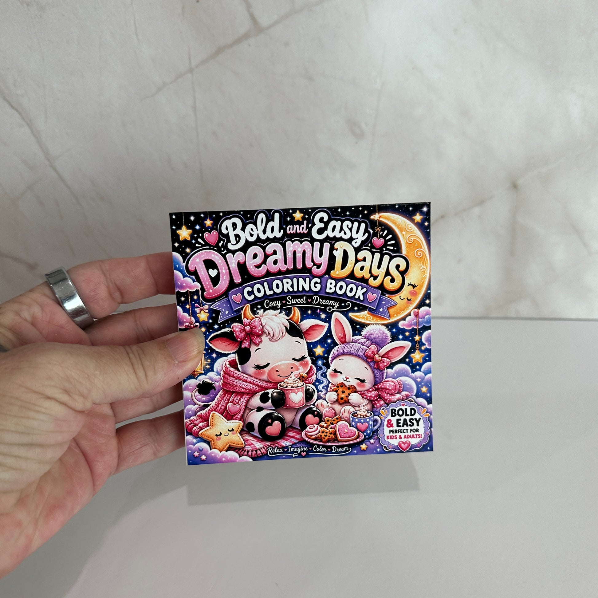 Mini coloring book featuring a cozy cow and bunny under a crescent moon with bold, easy coloring pages for kids, teens, and adults.