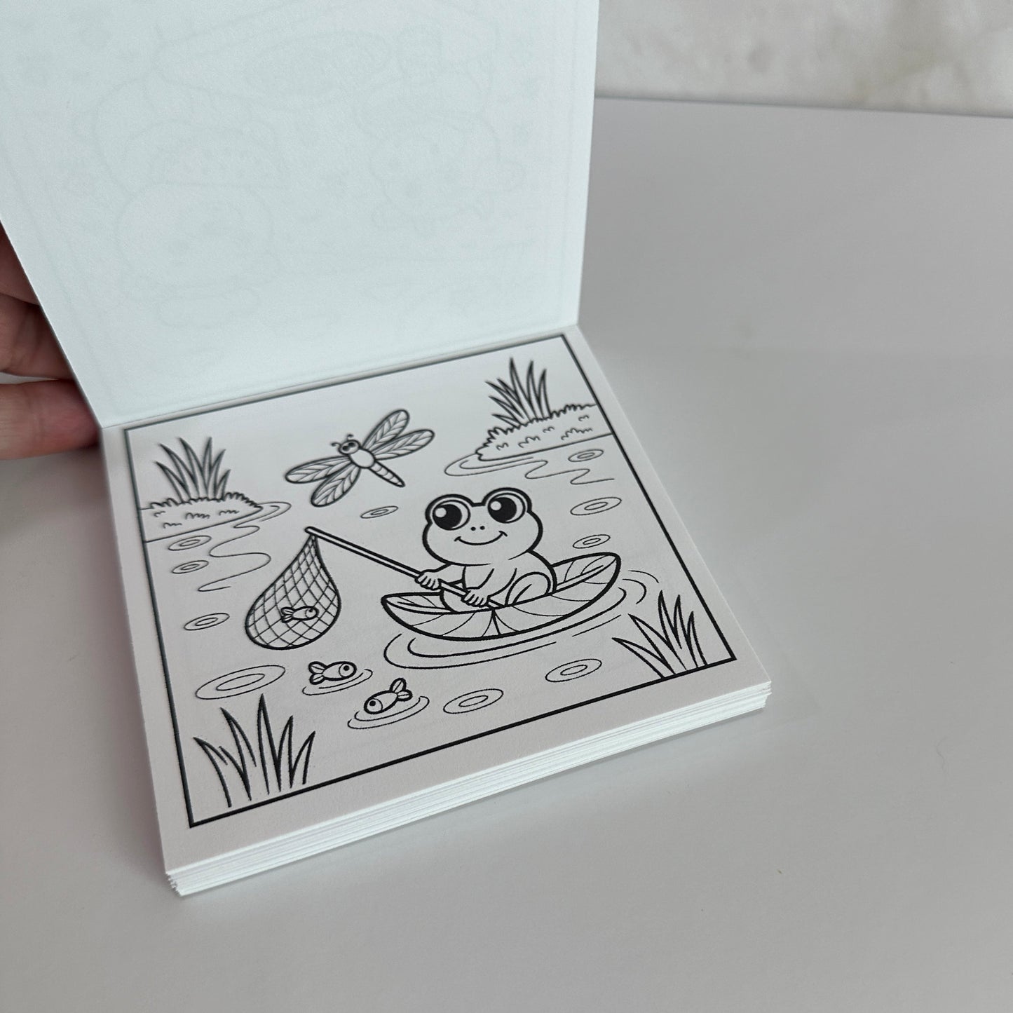 Mini coloring book featuring a cozy cow and bunny under a crescent moon with bold, easy coloring pages for kids, teens, and adults.