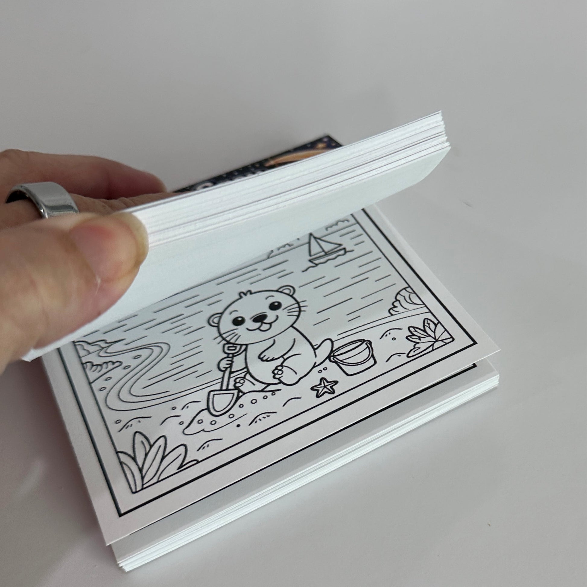 Mini coloring book featuring a cozy cow and bunny under a crescent moon with bold, easy coloring pages for kids, teens, and adults.