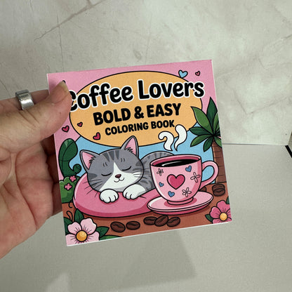 Coffee Lovers Bold and Easy Mini Coloring Book featuring cute sleeping kitten beside a pink coffee cup with cozy café themed illustrations.