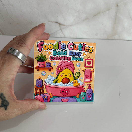 Foodie Cuties Bold Easy mini coloring book featuring a kawaii avocado relaxing in a bubble bath with spa accessories.