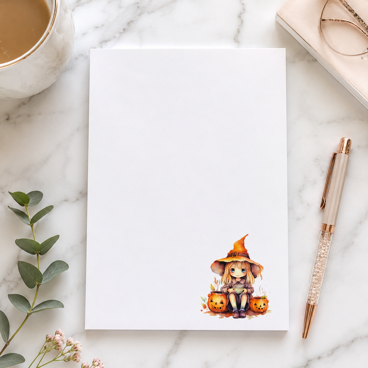 Halloween witch notepad featuring a cute witch sitting beside pumpkins on a white memo pad, autumn stationery gift for fall desk organization.