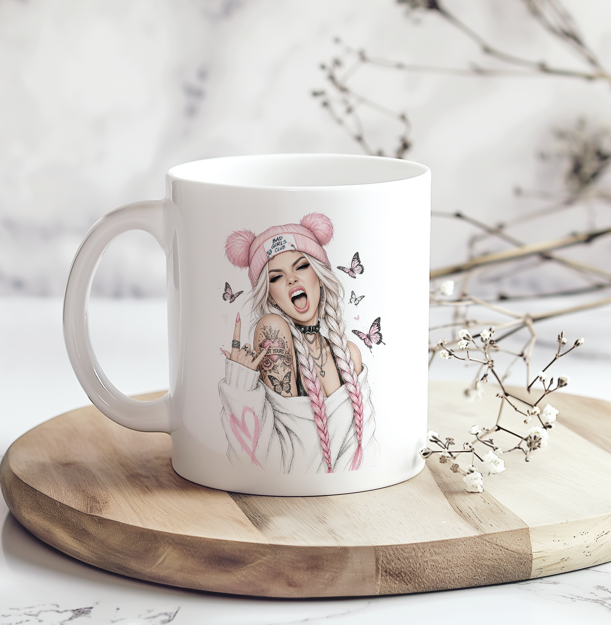 White ceramic coffee mug featuring a tattooed girl wearing a pink "Bad Girls Club" beanie with braided hair, butterflies, and a rebellious attitude, perfect as a funny sassy coffee mug gift.