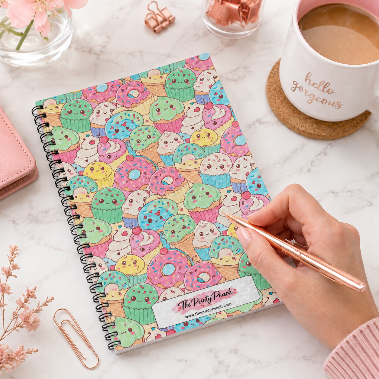 Pastel kawaii dessert spiral notebook featuring cute donuts, cupcakes, ice cream treats, and smiling sweets on a colorful glossy cover.
