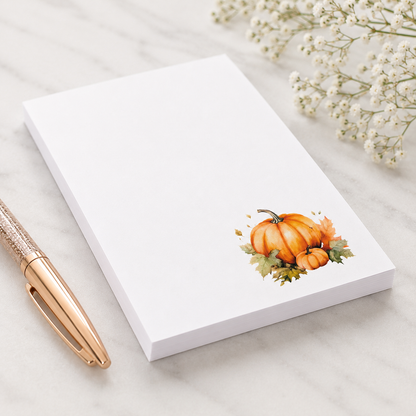 White notepad featuring a watercolor pumpkin illustration in the lower corner, perfect for fall notes, lists, and seasonal desk decor.