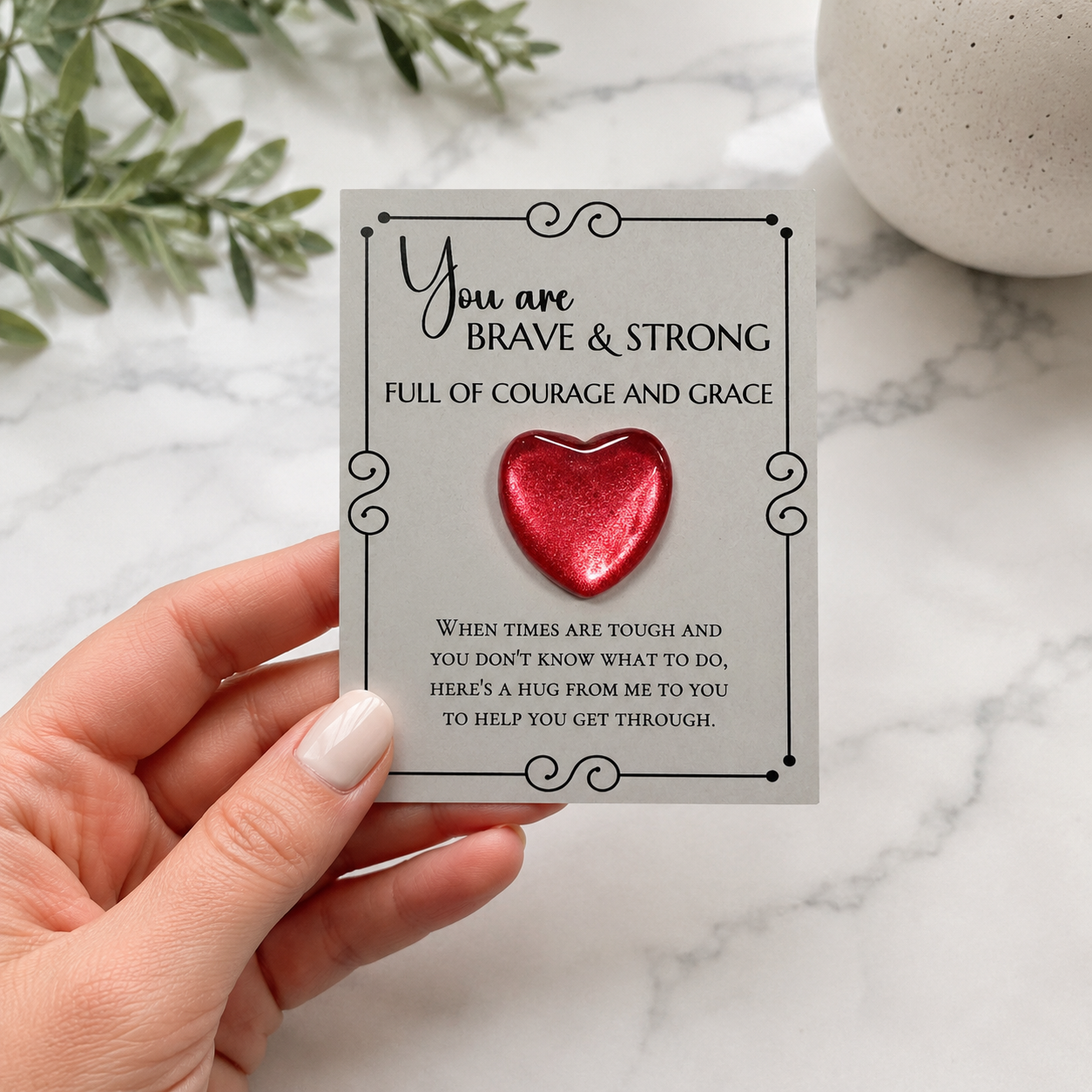 Inspirational pocket hug keepsake with a heart-shaped token on a "You Are Brave & Strong" encouragement card, a thoughtful comfort gift for friends, family, coworkers, or anyone needing support.