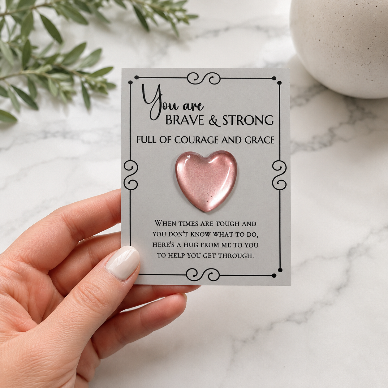 Inspirational pocket hug keepsake with a heart-shaped token on a "You Are Brave & Strong" encouragement card, a thoughtful comfort gift for friends, family, coworkers, or anyone needing support.