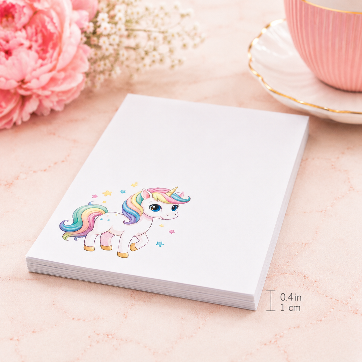 Cute unicorn notepad with rainbow pastel unicorn illustration on white paper pad, kawaii stationery gift for notes and reminders.